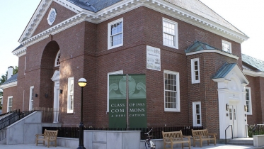 an exterior photo of of 53 commons dining hall building